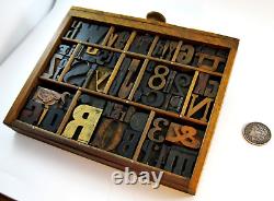 64 pcs. Vintage/antique letterpress in a section of type case with stand. Nice