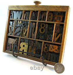 64 pcs. Vintage/antique letterpress in a section of type case with stand. Nice