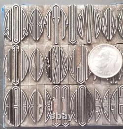 Caractères d'impression en typographie 60pt Virkotype Monogrammes Contours Assortis C41 3#