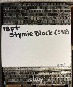 Police d'écriture ATF Stymie Black (598) en 18 points, ensemble de plus de 700 pièces.